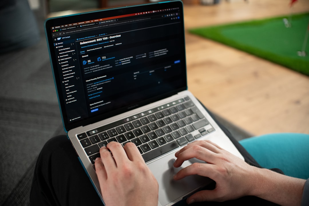 Driving school instructor using management software on tablet to schedule lessons and track student progress