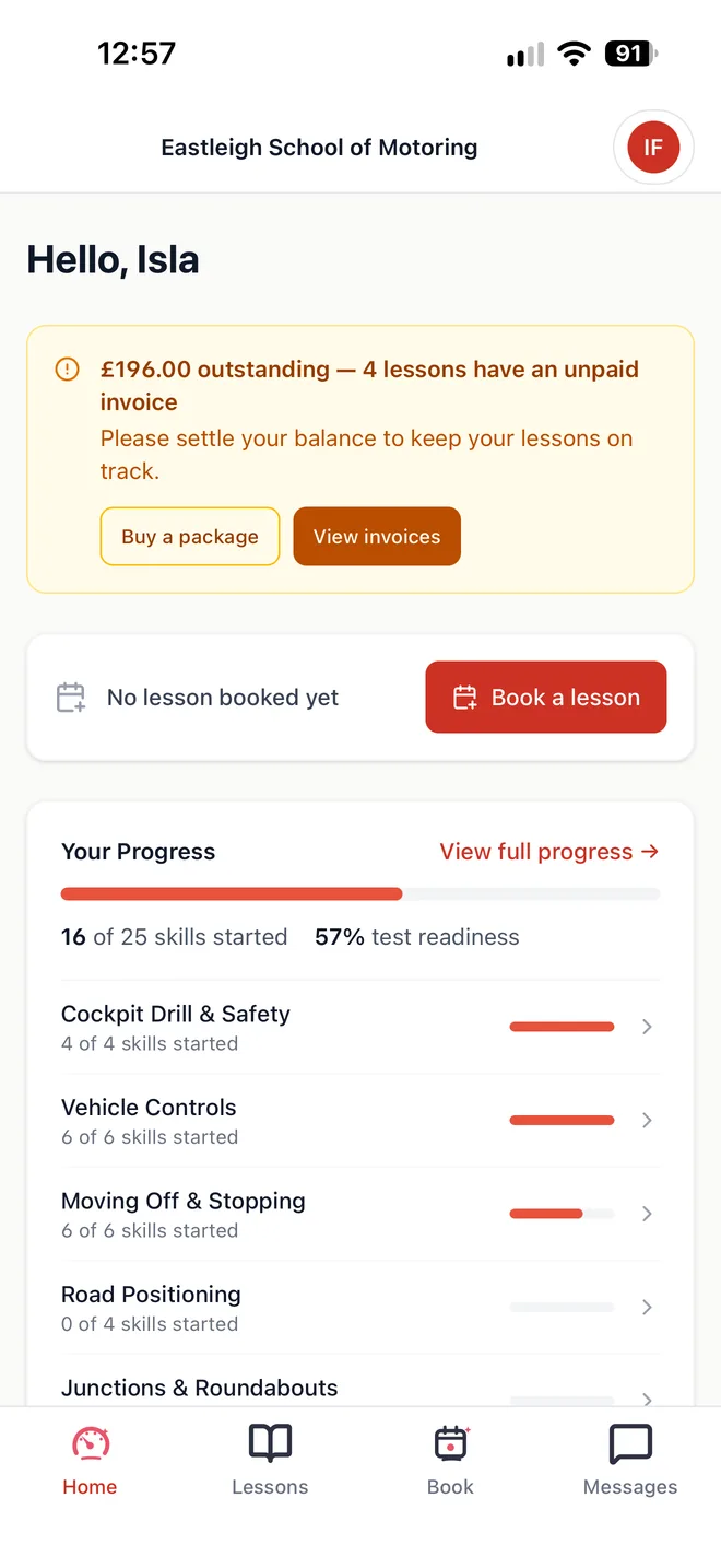 A pupil’s DriveSchoolPro app on a phone showing their balance, a Book a lesson button and their progress